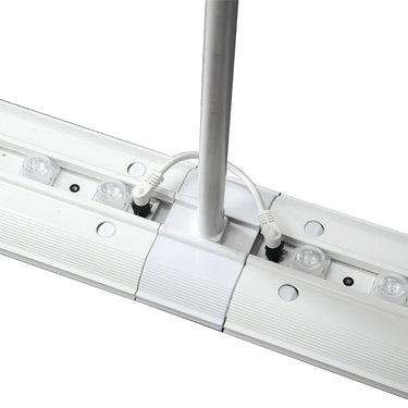 Low-profile stabilizing foot for FramePlus freestanding LED exhibition lightbox